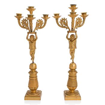 A pair of Charles X four-light candelabra, France, around 1820.