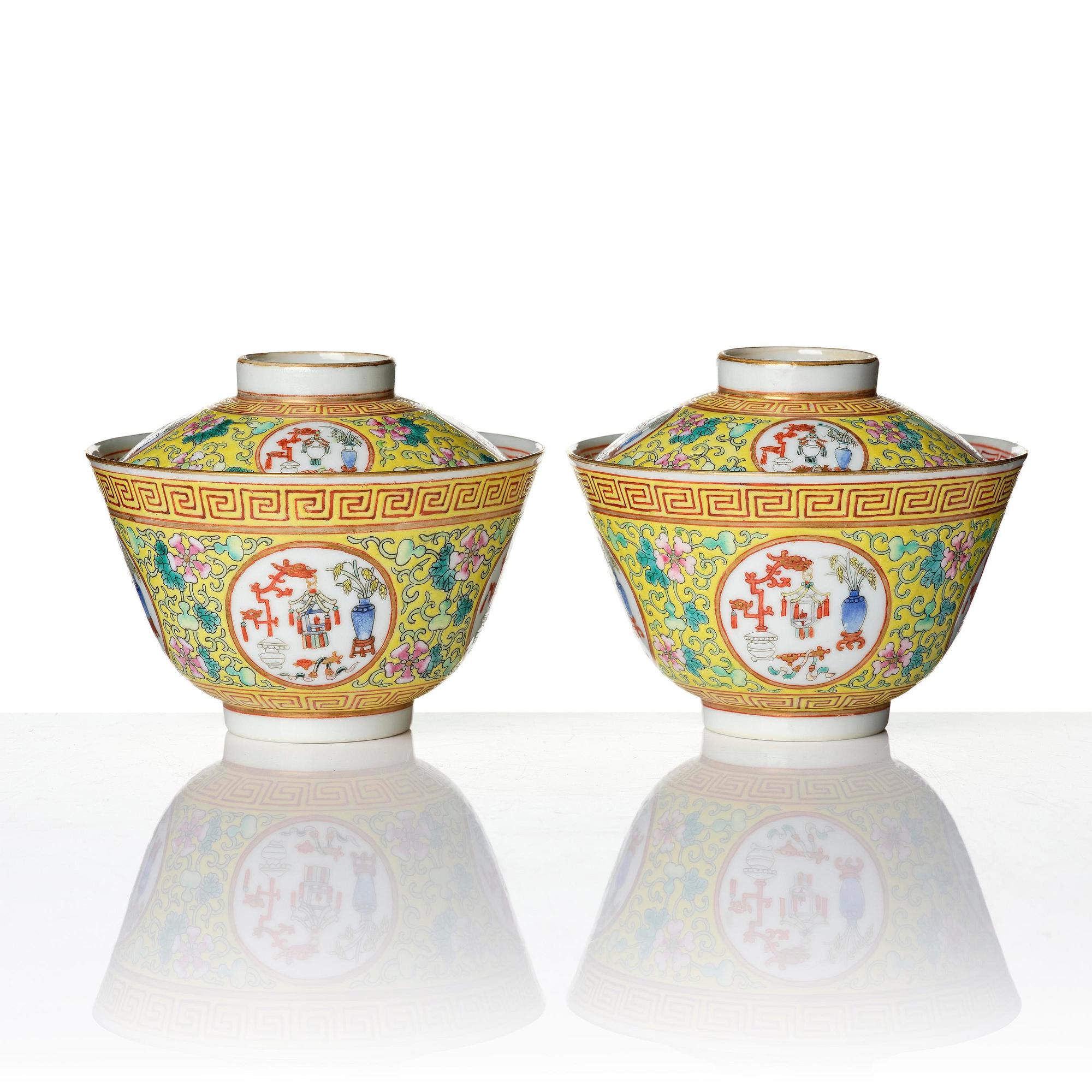 A pair of yellow ground 'medallion' bowls with covers, Qing dynasty with Daoguang mark.