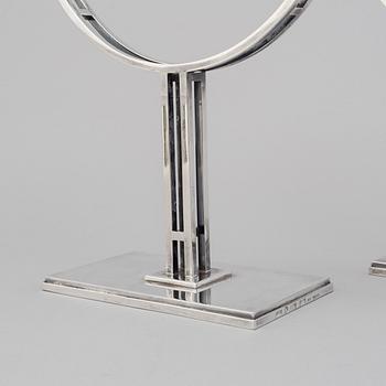 A pair of Klas-Göran Tinbäck two light sterling silver candelabra. Stockholm, 1989.