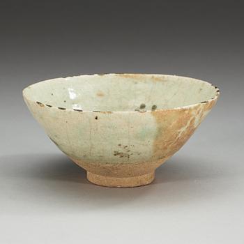 BOWL, pottery. White slip with a slight blue glaze and black decoration. Persia, probably 13th century.