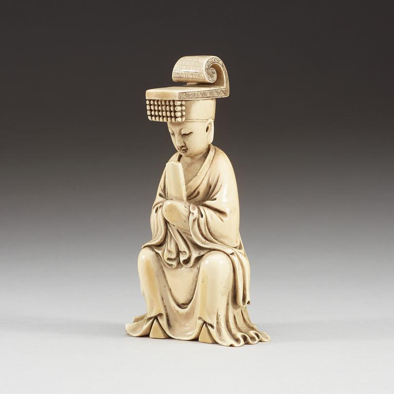 An ivory figure of a dignitary, Qing dynasty (1644-1912).