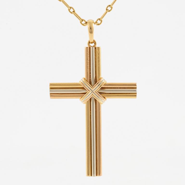 A Cartier necklace 18K multi-coloured gold "Trinity" cross.
