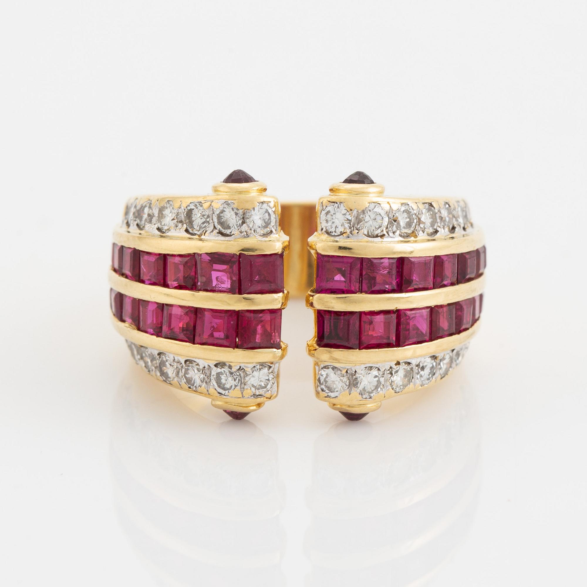 Step cut ruby and brilliant cut diamond ring.