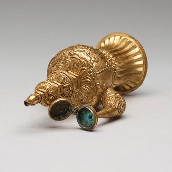 A Tibetan gilt copper bumpa, 19th Century.