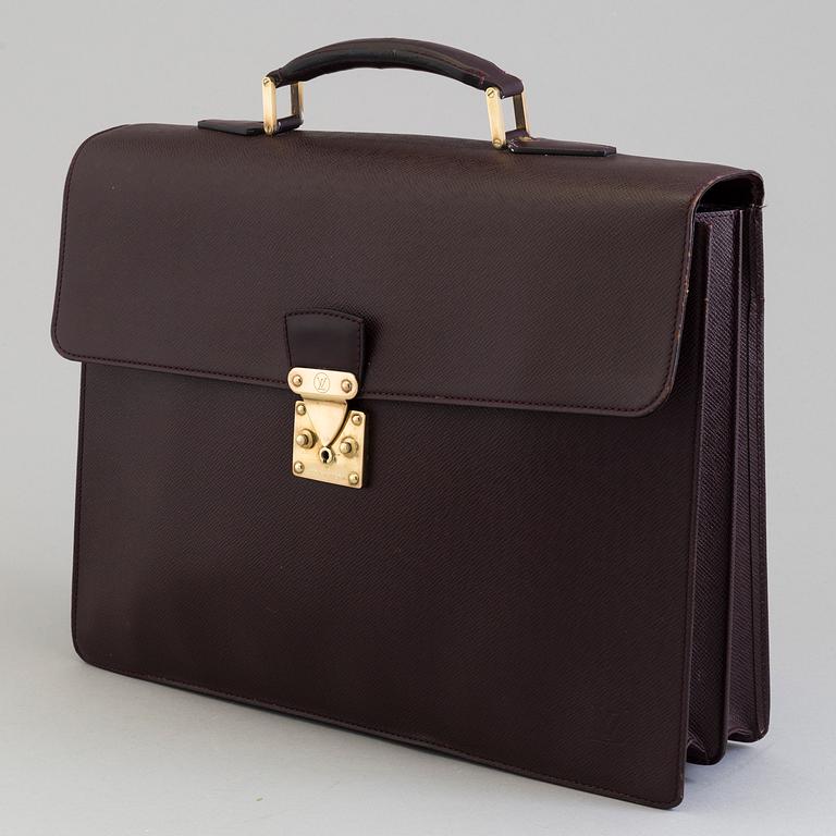 A 'Moskova' taiga leather briefcase from Louis Vuitton.