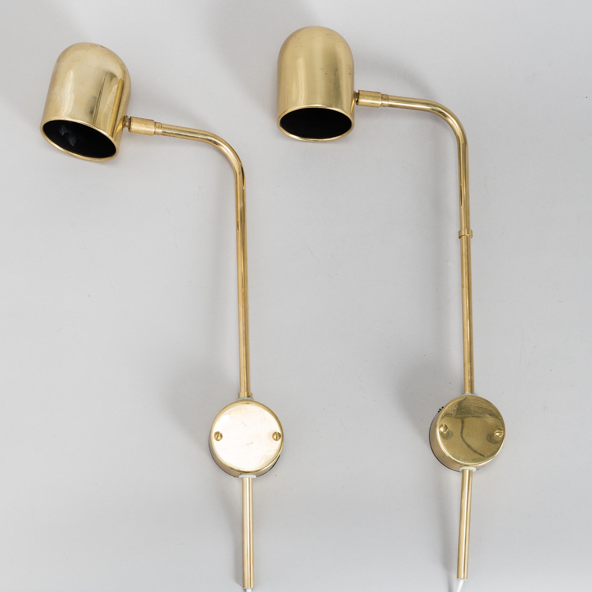 A pair of brass wall lights by Bergboms.