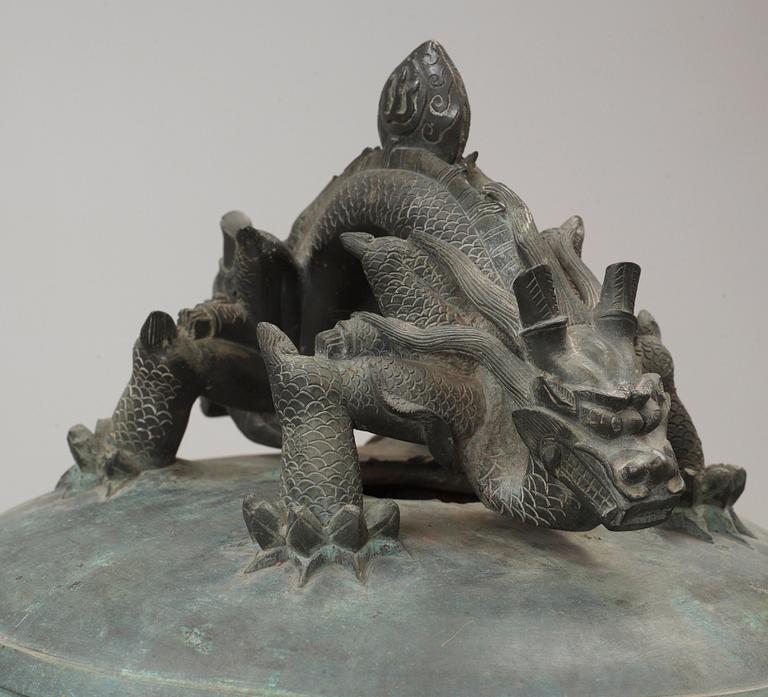 A large dated bronze Buddhist temple bell, Qing dynasty (1644-1912).