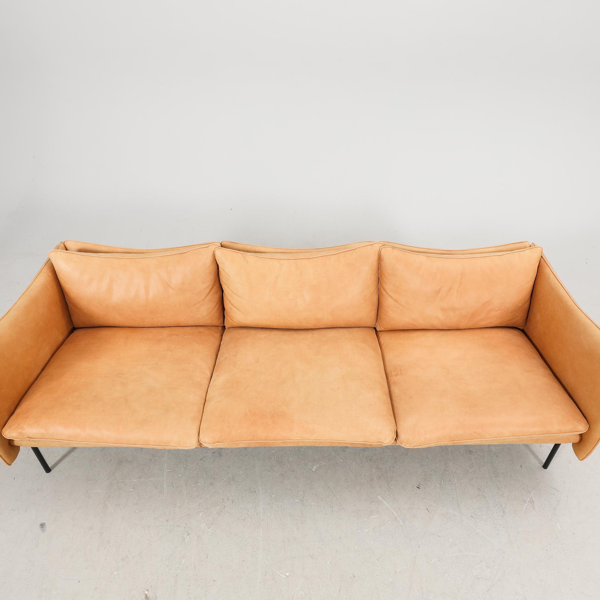 Andreas Engesvik, a Tiki leather sofa and stool for Fogia 21st century.