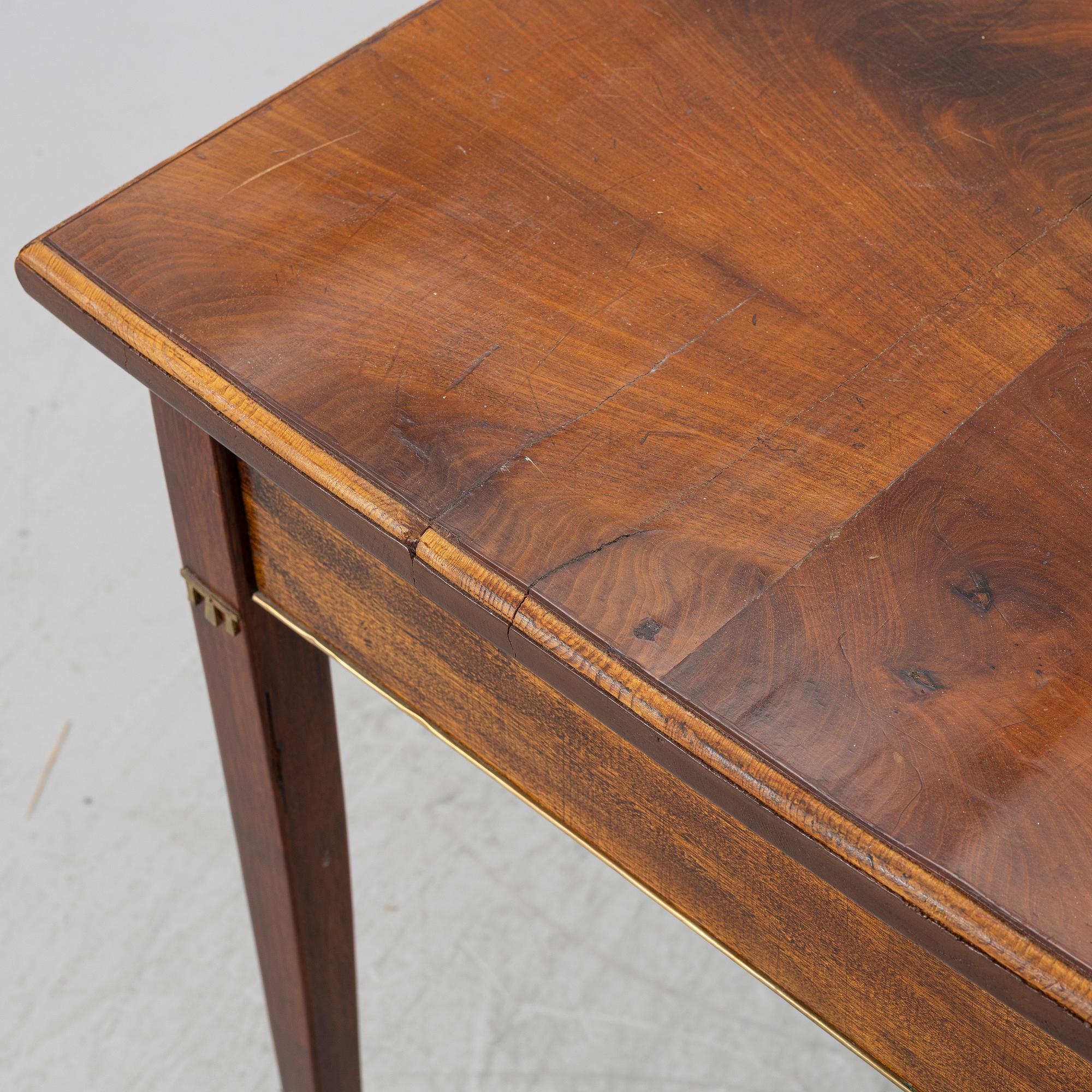A late-Gustavian style desk with older parts, around 1900.