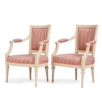 A pair of late Gustavian open armchairs by E. Öhrmark (master in Stockholm 1777-1813).