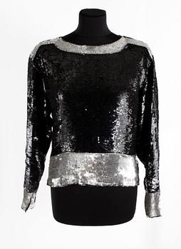 382. A 1980s top by Yves Saint Laurent.