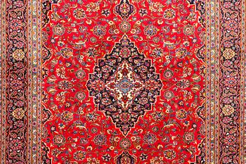A Keshan carpet, c. 405 x 300 cm.