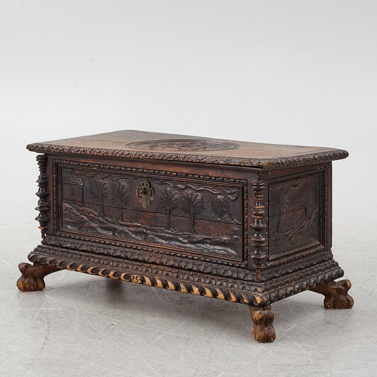 A baroque style wooden chest, 19th century.