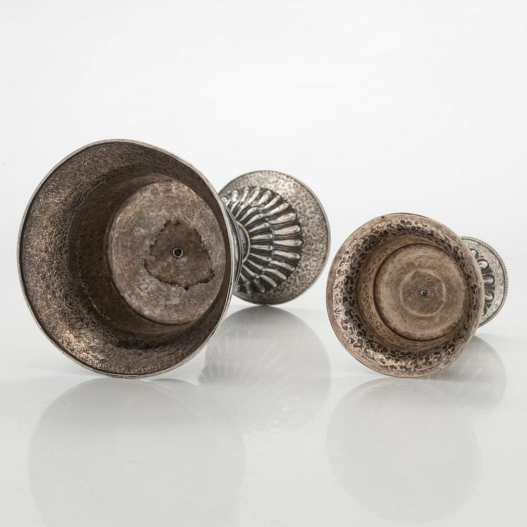 Two silver butter lamps, Tibet, 19th century.