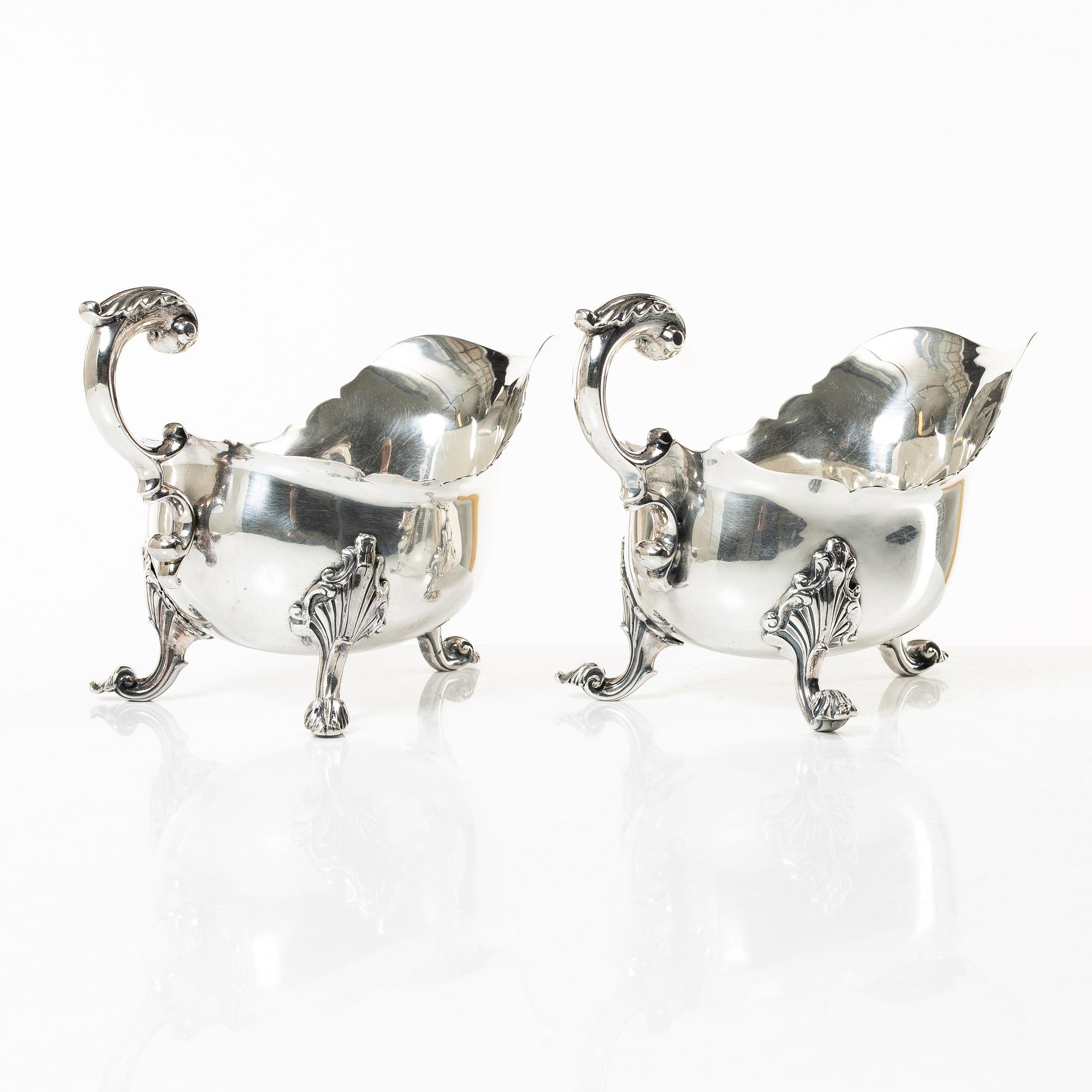 A pair of 18th century silver sauce boats, Richard William, Ireland, spoons, Peter & William Bateman, London 1807.