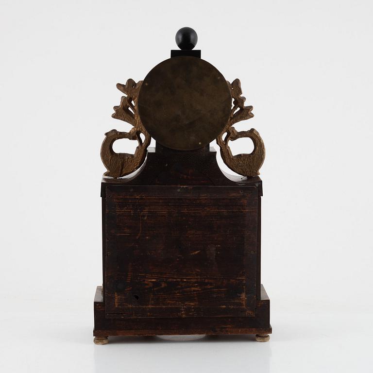 A presumably Austrian mahogany, gilt-brass, and alabaster portico mantel clock, early 19th century.