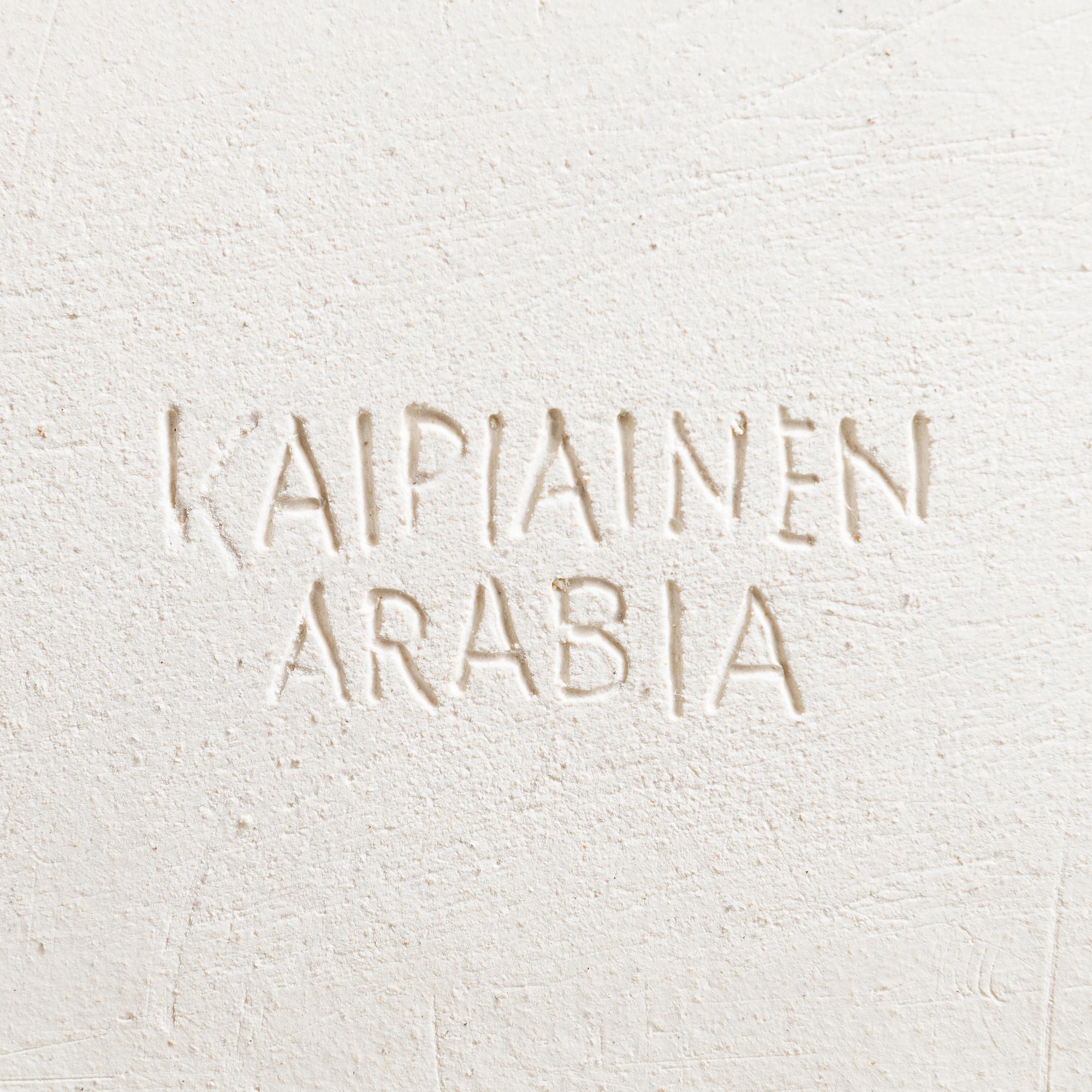 BIRGER KAIPIAINEN, a stoneware decorative dish signed Kaipiainen Arabia.