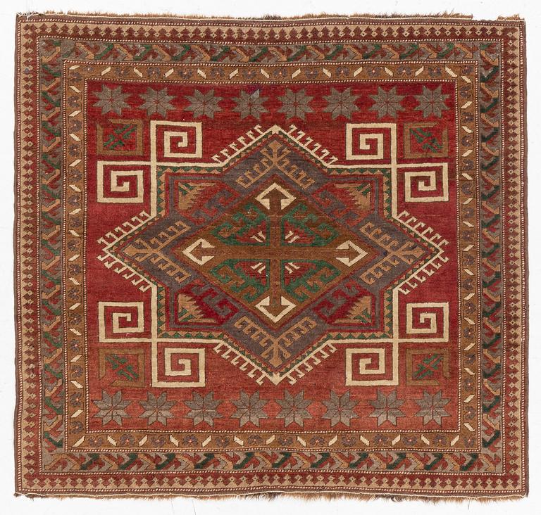 A Kazak rug, semi-antique, c. 137 x 148 cm.