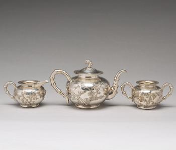 A Chinese export silver three-piece tea service, mark of Luen Wo, Shanghai, circa 1880-1925.