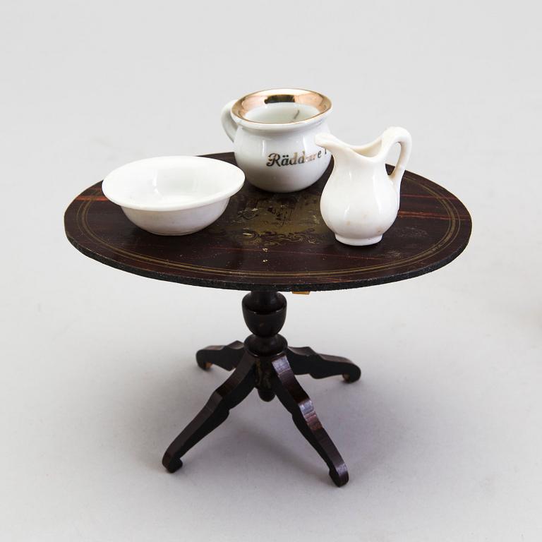 A set of ca 40 pieces of doll house furniture and accessories, including Waltershausen, Germany, 19/20th century.
