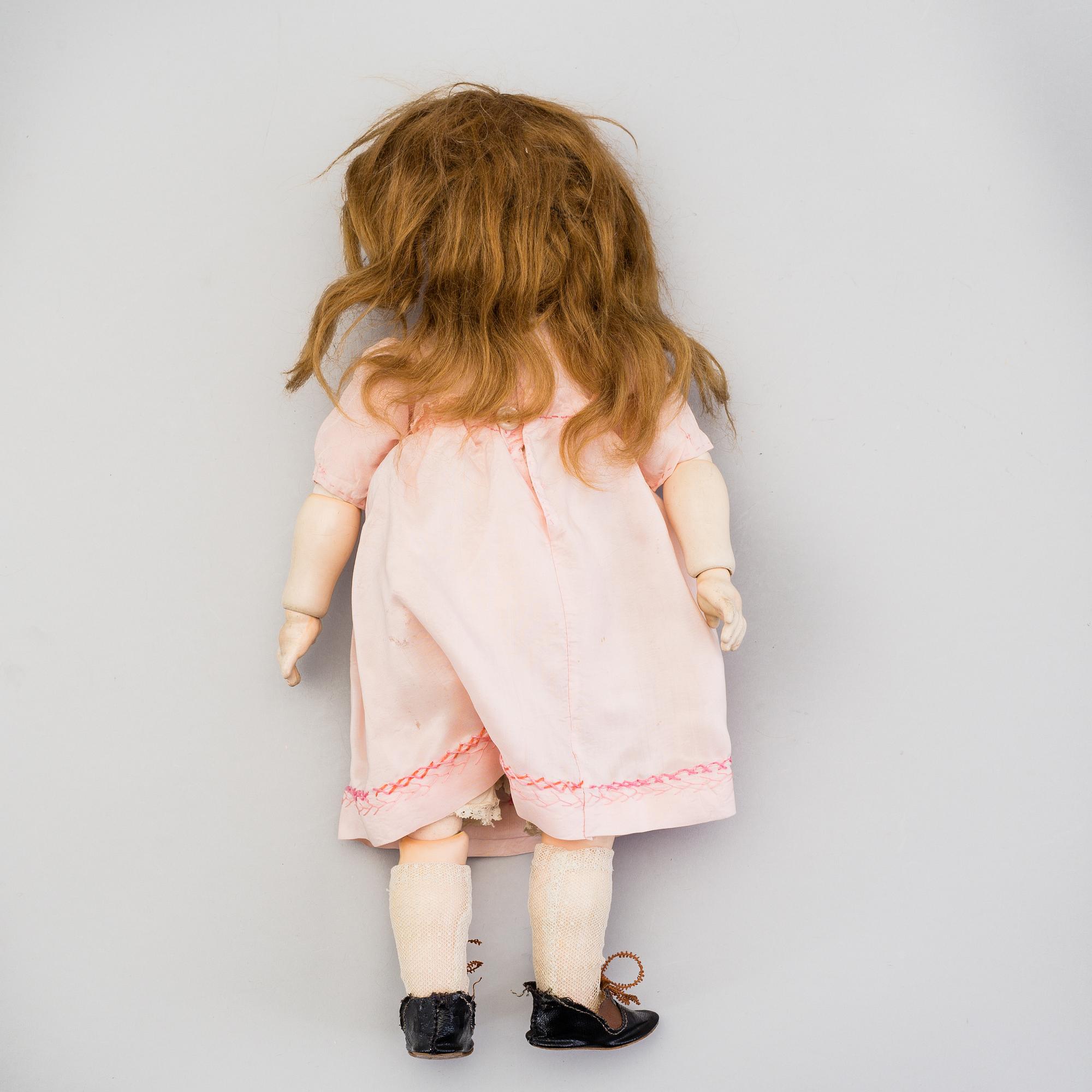 A Simon & Halbig 117n bisque head doll, Germany.