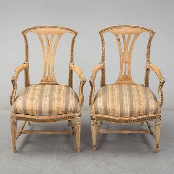 A pair of later part of th 18th century Gustavian arm chairs.