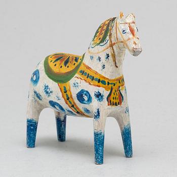 A painted Swedish wooden horse from the early 20th century.