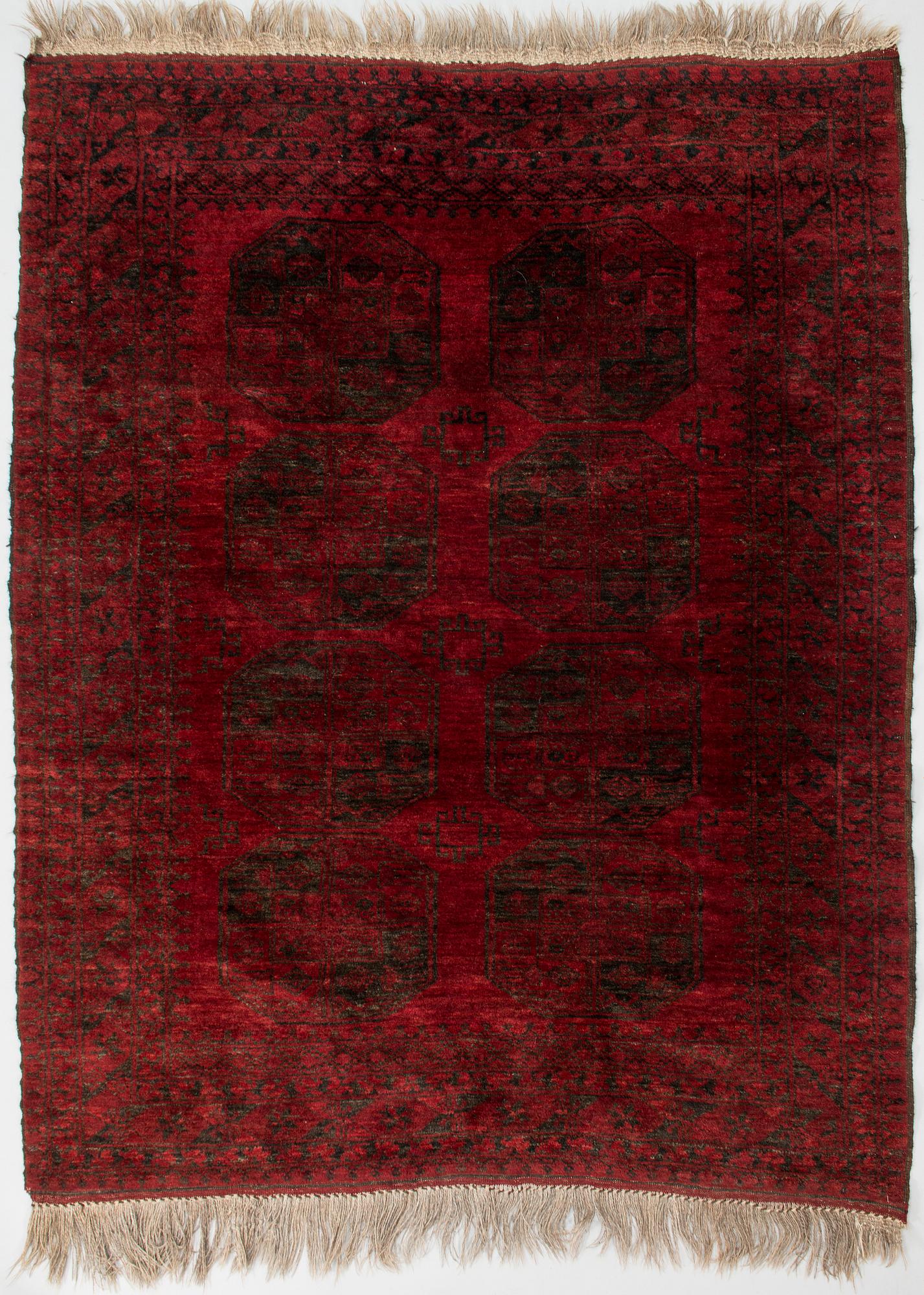 A semi-antique Afghan rug. Ca. 194x152 cm.