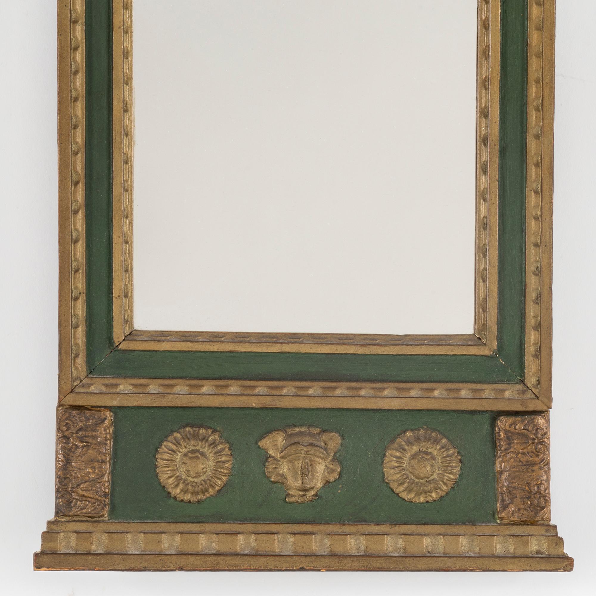 An empire mirror, first half of the 19th century.