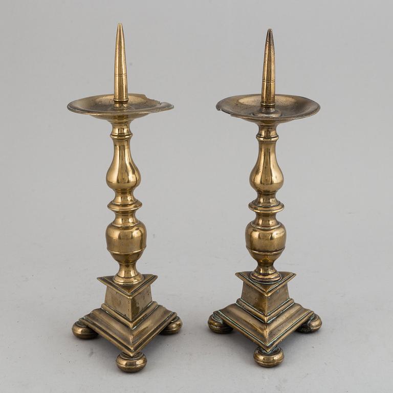 A pair of 17th century bronze candlesticks.