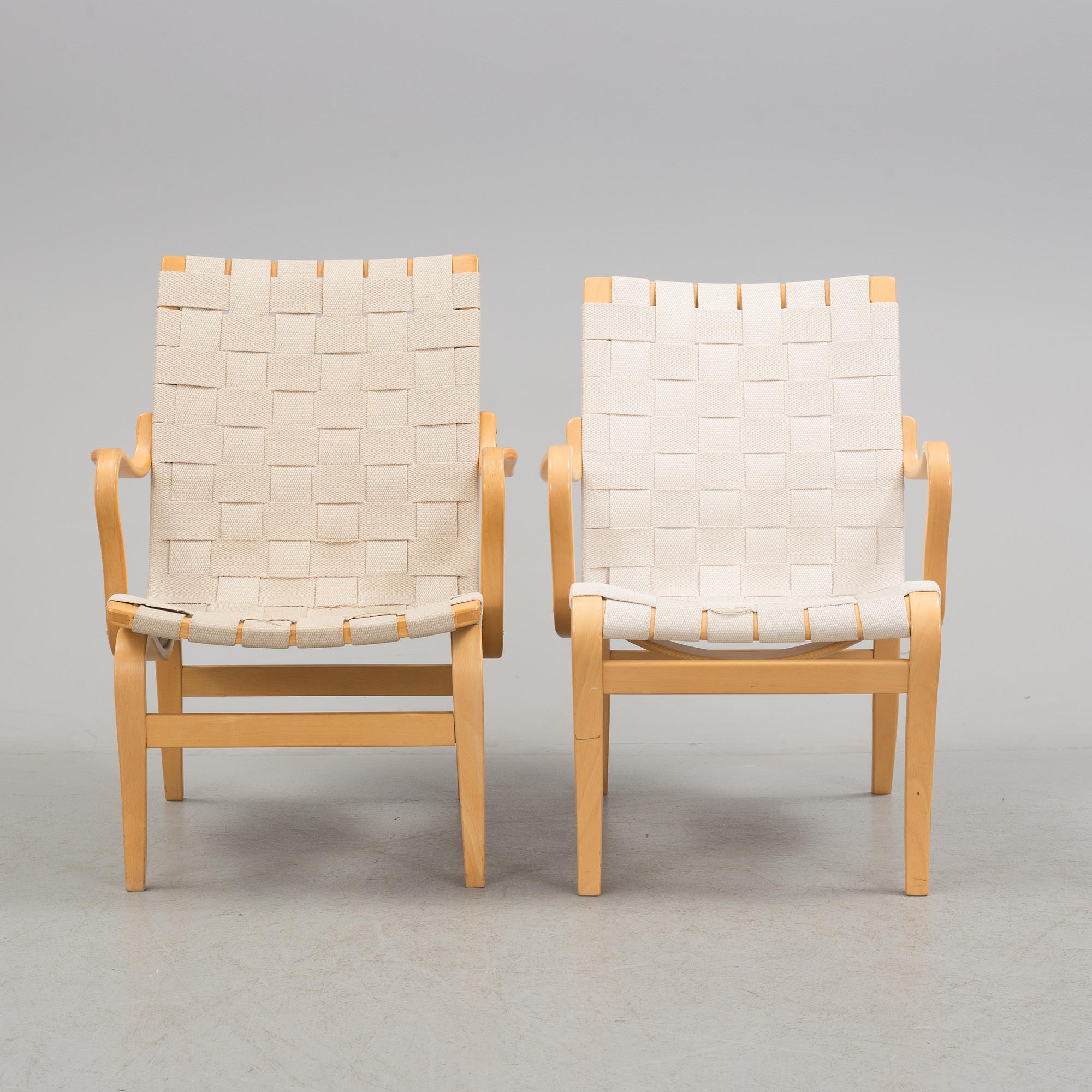 two armchairs by Bruno Mathsson, one "Eva" and one "Mina".