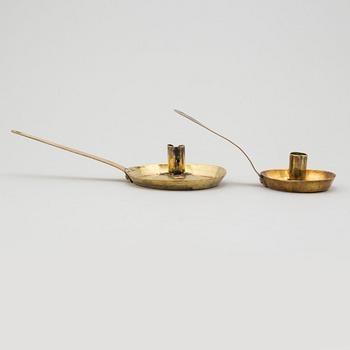 Two brass candlesticks, 18th century.