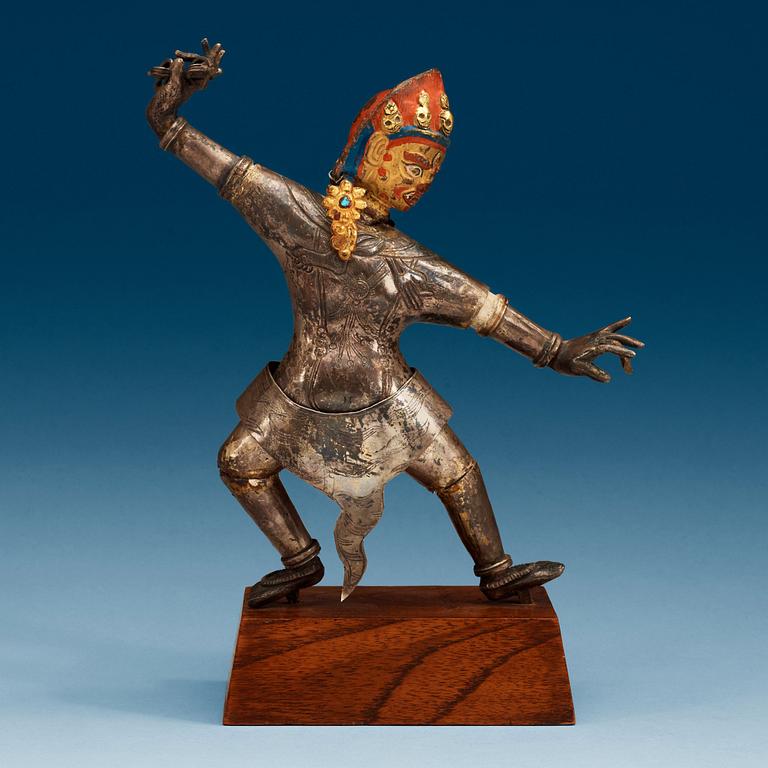 A silvered and gilt and lacquered bronze figure of a tantric deity, possibly Vajrayogini, Tibet, 19th Century.