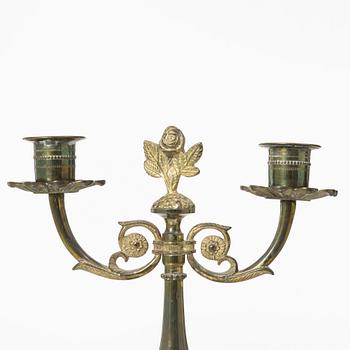 Candle holders, a pair of brass, Empire style, 20th century.