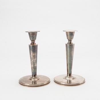 A pair of silver candlesticks. Eric Råström, Stockholm. 1945. Total weight 400 gram.