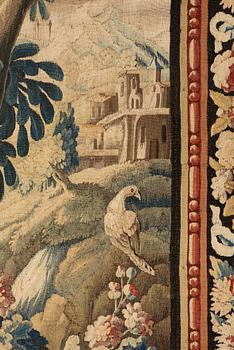 A tapestry, "Verdure", tapestry weave, a so called "entre-fenêtre", ca 295-296 x 126-129,5 cm, signed M.R.DABVSON.i.D.