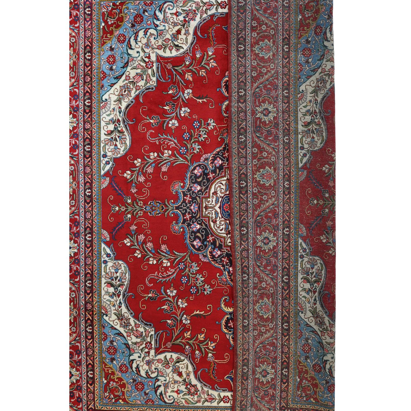 A Tabriz carpet, c 394 x 302 cm.