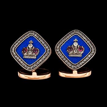 923. A pair of blue enamel, ruby and diamond cufflinks with the Russian state crown.