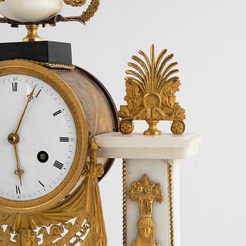 A French Louis XVI ormolu and marble portico clock, late 18th century.