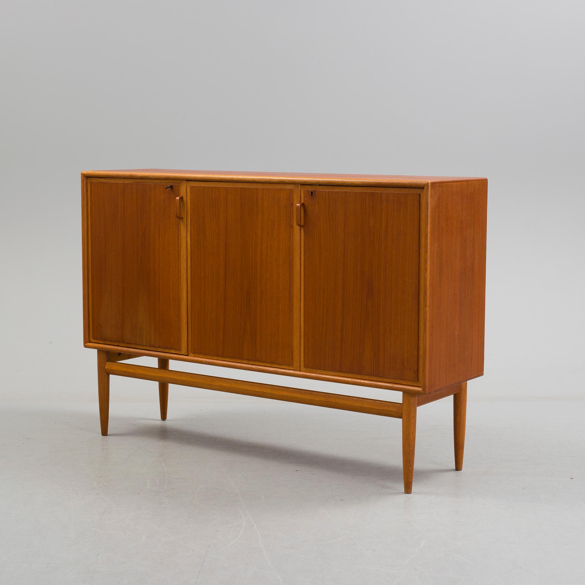 A second half of the 20th century teak veneered sideboard by Bertil Fridhagen, Bodafors, Sweden.
