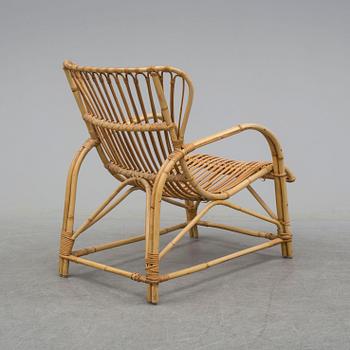 A mid 20th century easy chair.