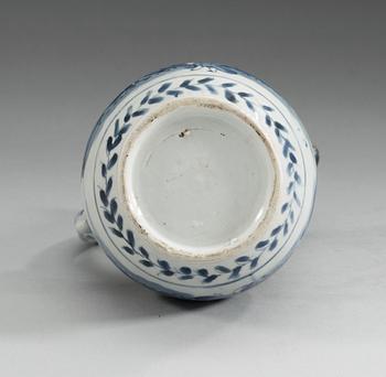 A blue and white Transitional wine ewer, 17th Century.