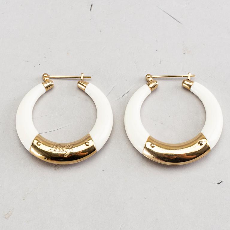 A pair of Dolce & Gabbana earrings.