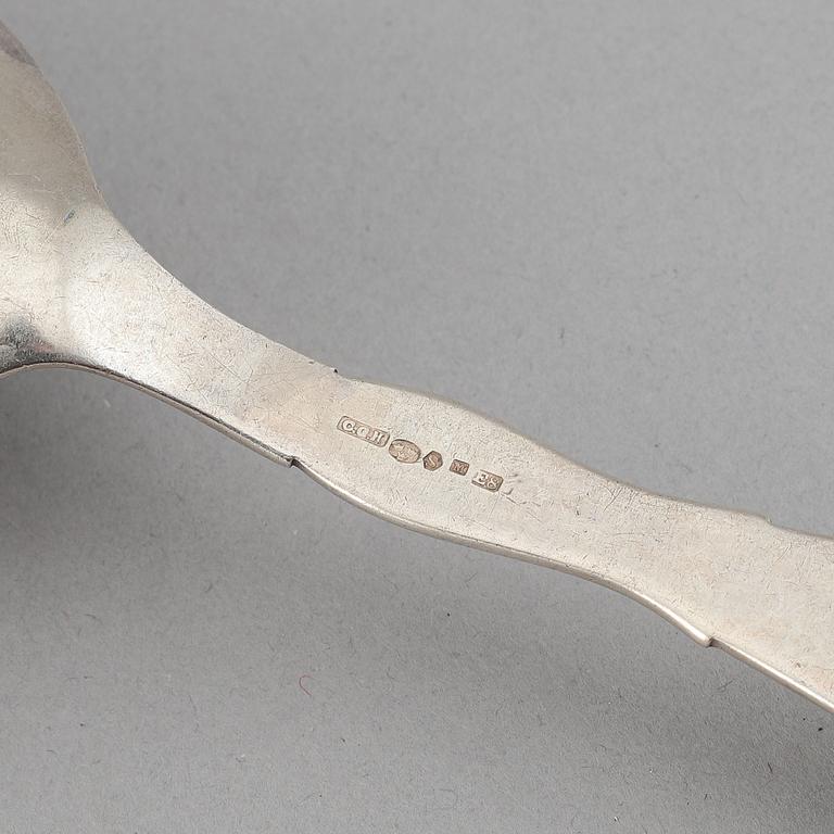 A pair of silver sallad utensils by C.G.Hallberg, Malmö, 1931, and sauce spoon W&S Sorensen, Danmark, early 20th century.
