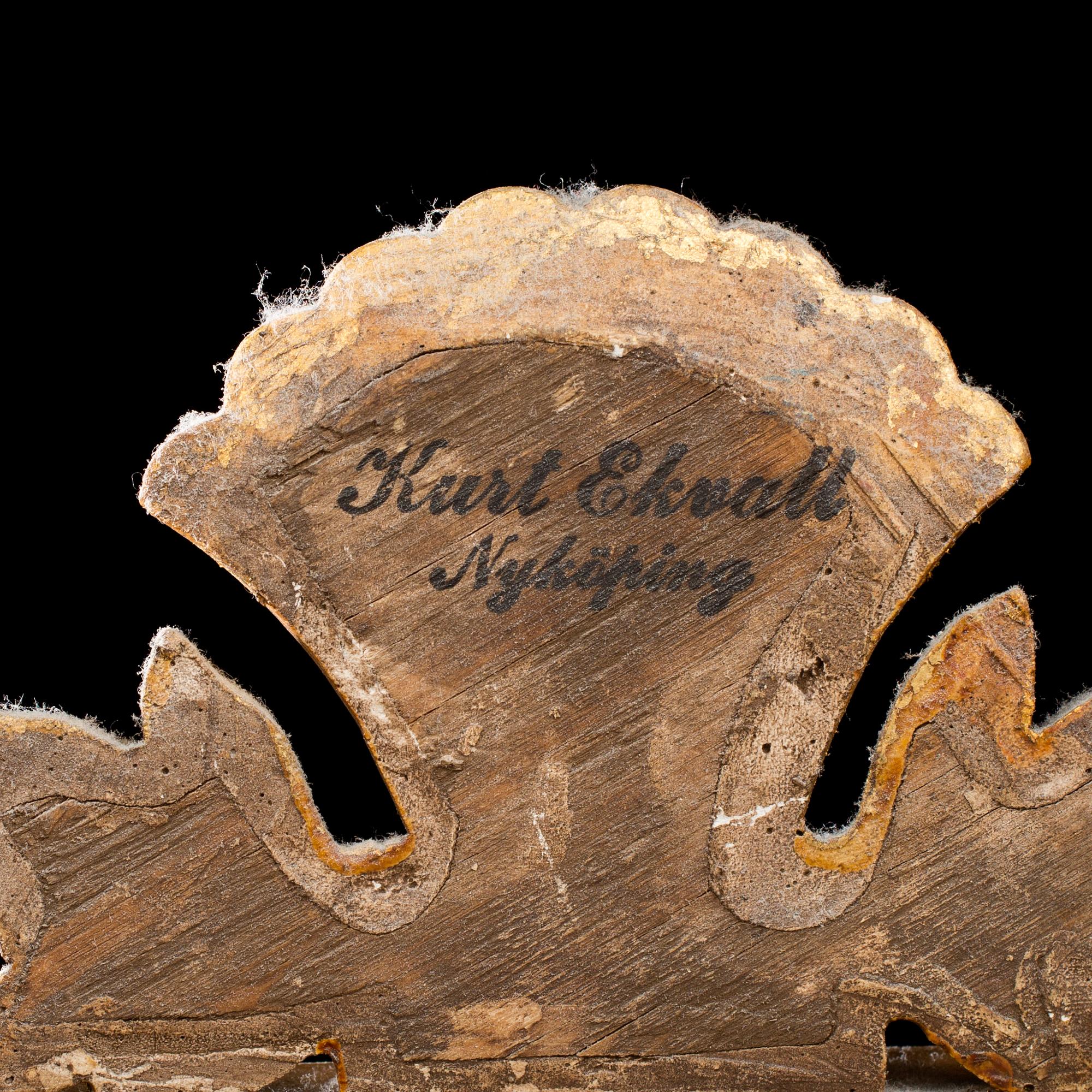 A pair of Swedish mid 20th century Gustavian style wall sconces from Kurt Ekvall in Nyköping.