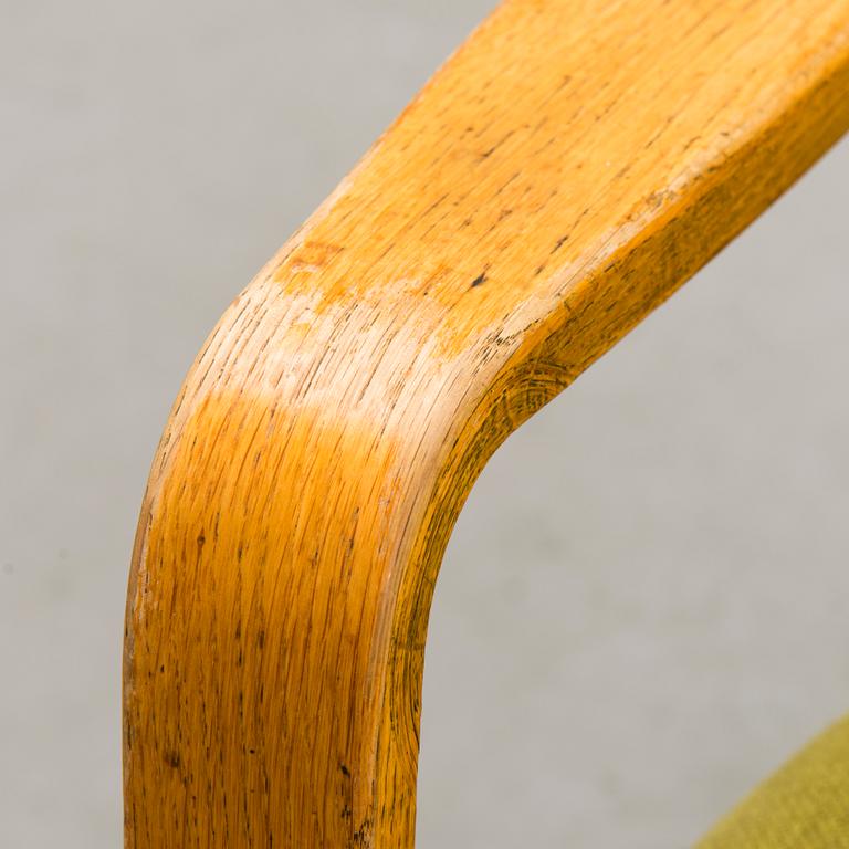 A 1960s 'Puck' armchair for Keravan Puusepäntehdas, Stockmann, Finland.