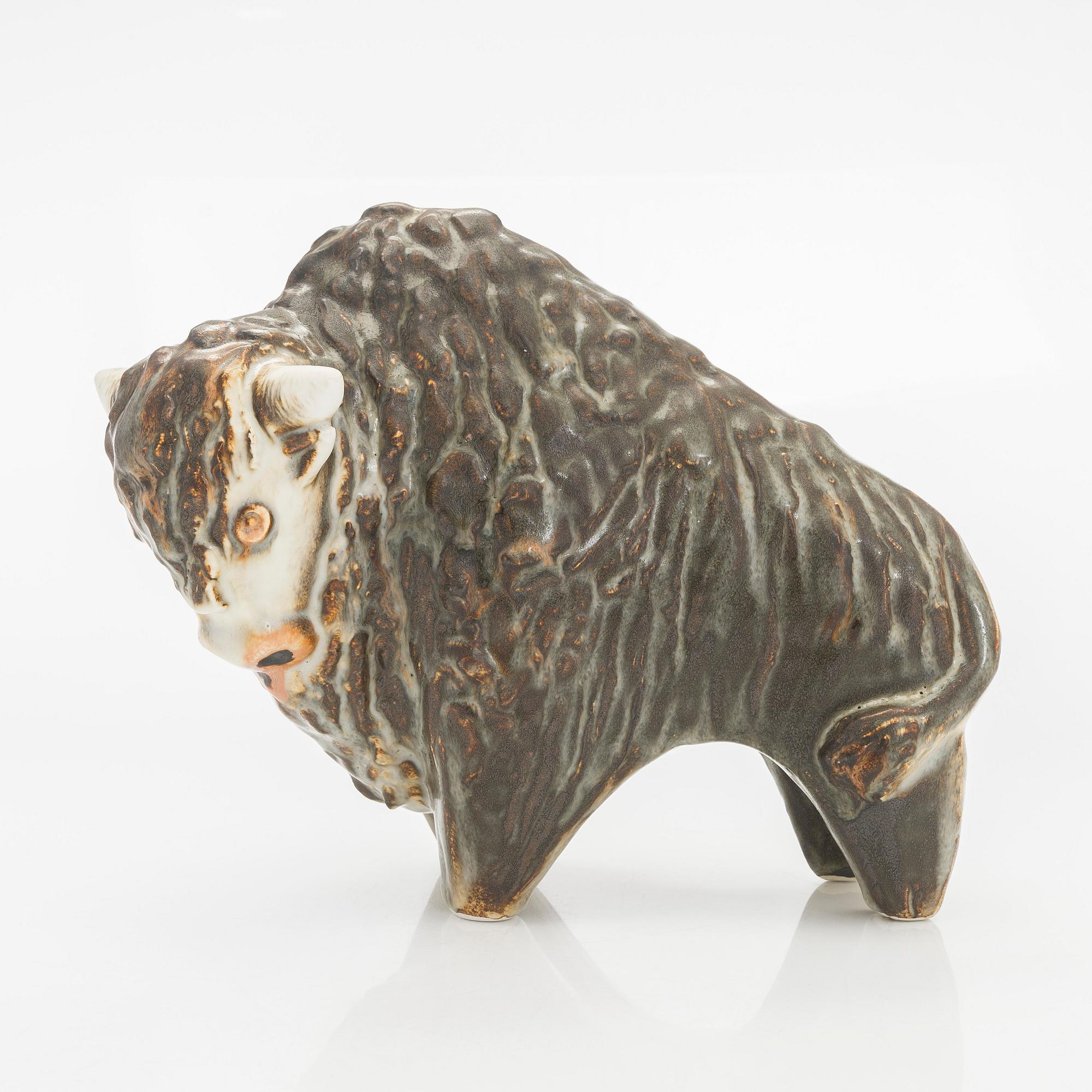 Taisto Kaasinen, A stoneware figurine, signed TK Arabia, 1960s-70s.