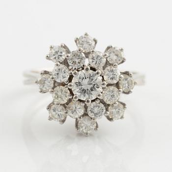 14K white gold and brilliant cut diamond cluster ring.