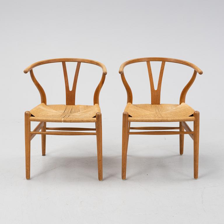 A pair of oak 'Y-chairs' by Hans J Wegner for Carl Hansen & Son, designed 1949.