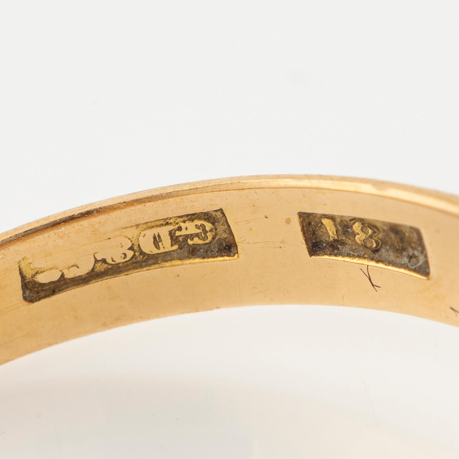 Två ringar med granater och rosa turmalin.